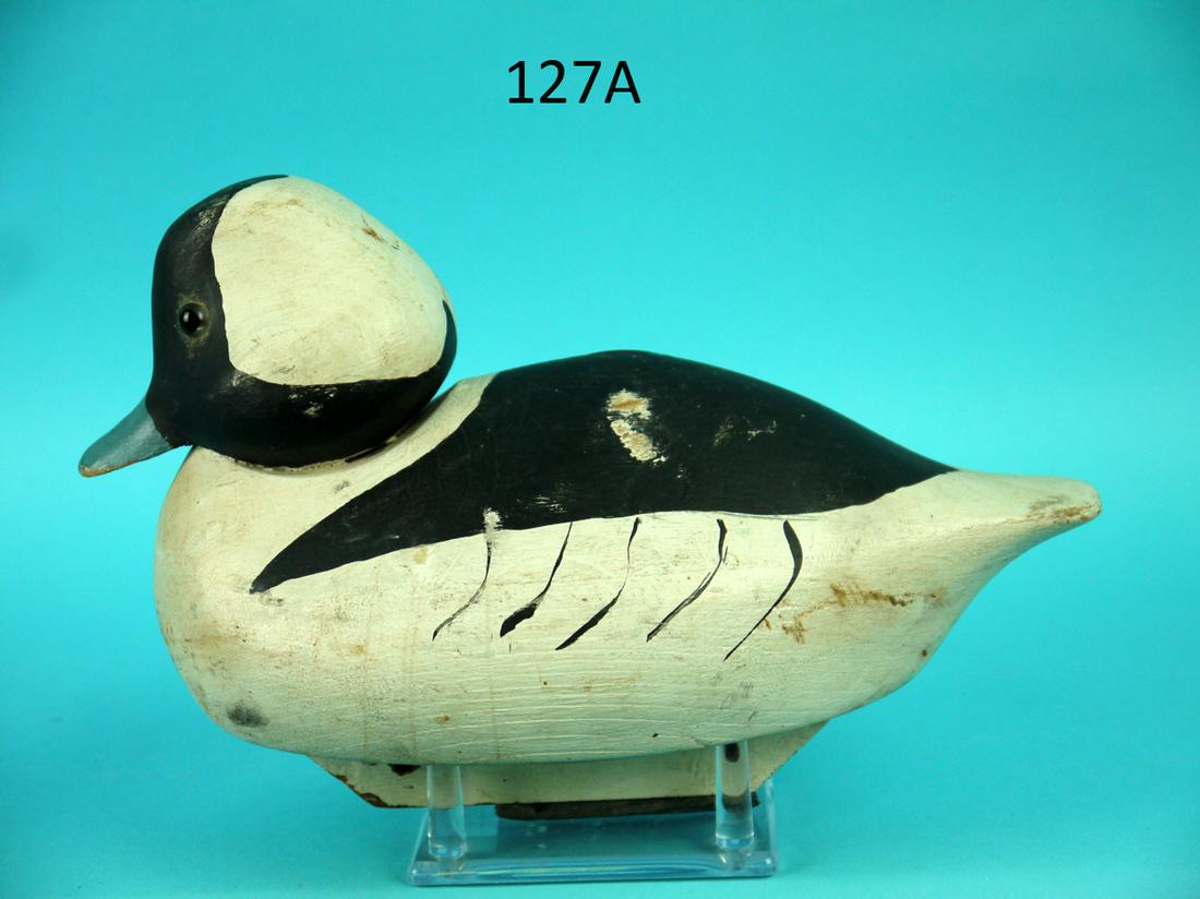BUFFLEHEAD DRAKE, WILDFOWLER: BUFFLEHEAD DRAKE by the Wildfowler Decoy Co., Pt. Pleasant, NJ. Good original paint with some wear. Good structural condition with some minor shot marks. Snug head model, retains glass eyes. Retains w
