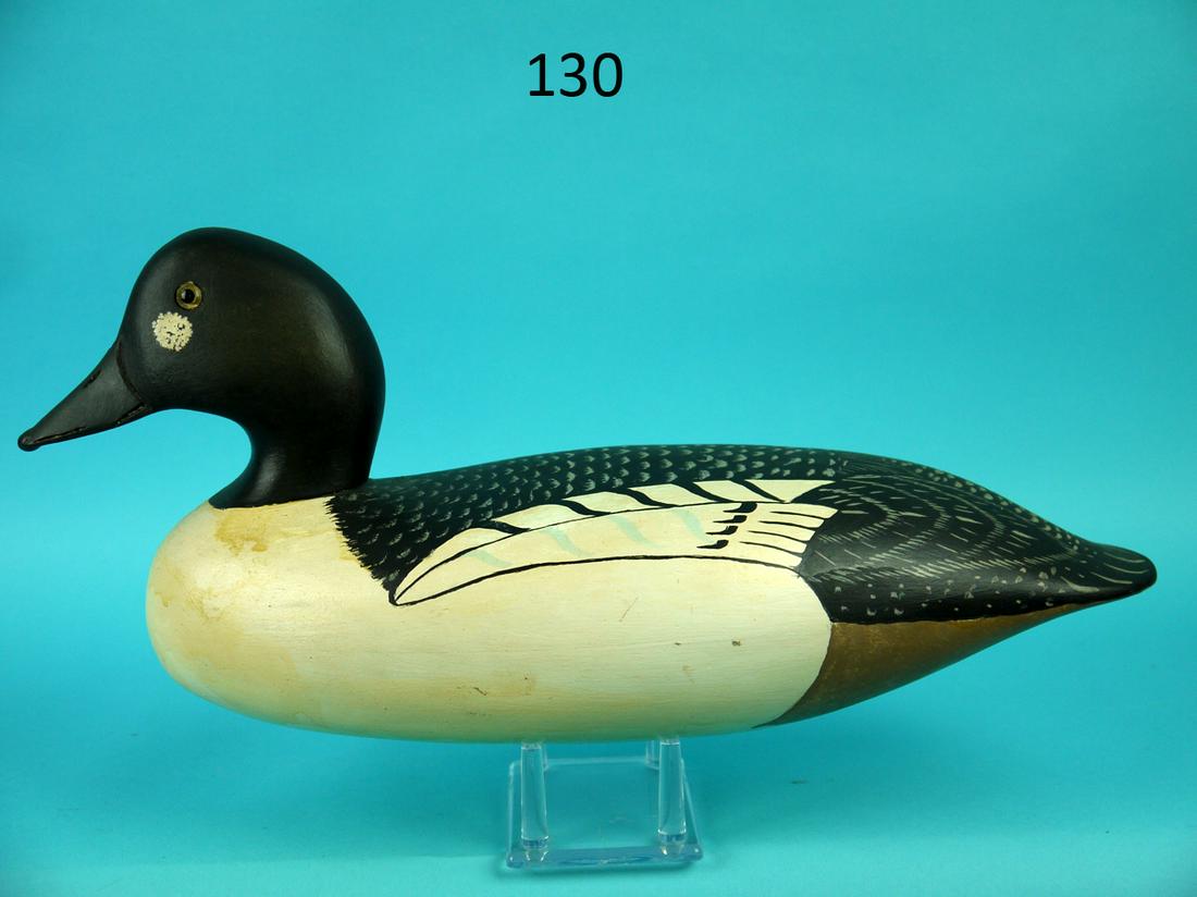 GOLDENEYE DRAKE, WILDFOWLER: GOLDENEYE DRAKE by the Wildfowler Decoy Company, Pt. Pleasant, NJ. Excellent original paint and condition. Hollow construction. W. KEIM painted under bill. Fine detailed painted feather work on back w