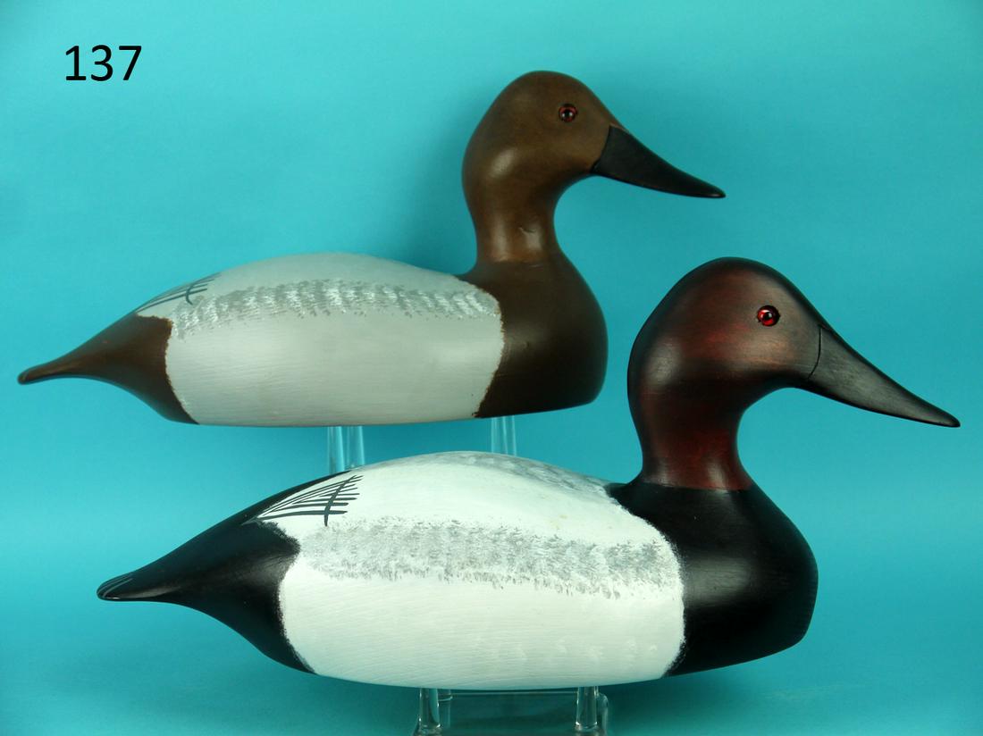 CANVASCK PAIR, WILDFOWLER, JENSEN BEACH: RARE PAIR OF CANVASBACKS by the Wildfowler Decoy Company, Jensen Beach, FL, by Tom Gamble, circa 2006. Excellent original paint and unused condition. Hollow construction. Both with painted feather det