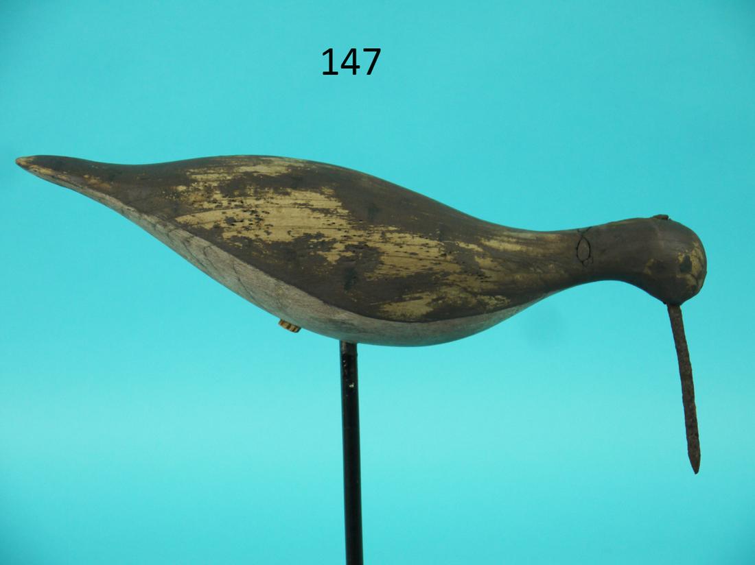 EARLY YELLOWLEG, SOUTH JERSEY: EARLY YELLOWLEG, South Jersey. Appears to be original paint, worn to wood on back and sides. Very good structural condition. Retains iron bill and two placement holes. Old knot hole in tail. Overall l