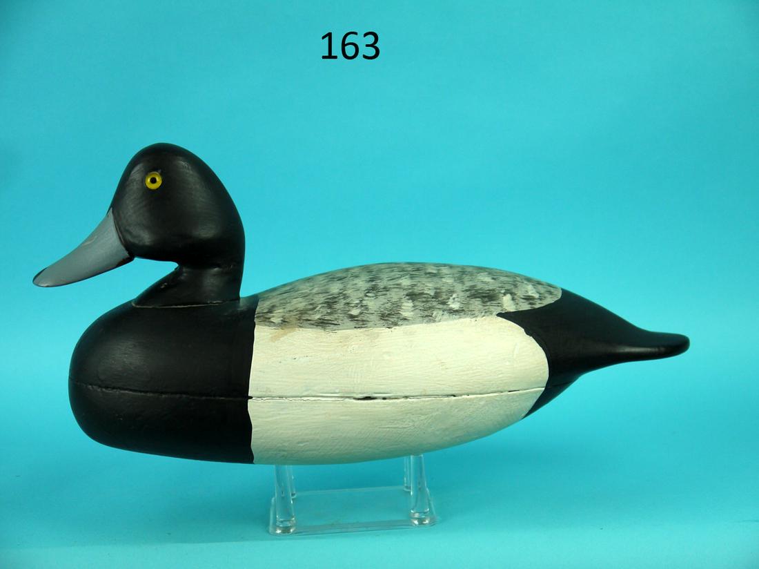 BROADBILL DRAKE, BARNEGAT BAY, NJ: VERY EARLY BROADBILL DRAKE, Barnegat Bay, NJ. Very good restored paint and condition. Hollow construction. Stipple feather paint detail to back. Detailed bill carving. Retains glass eyes. Inlet weight