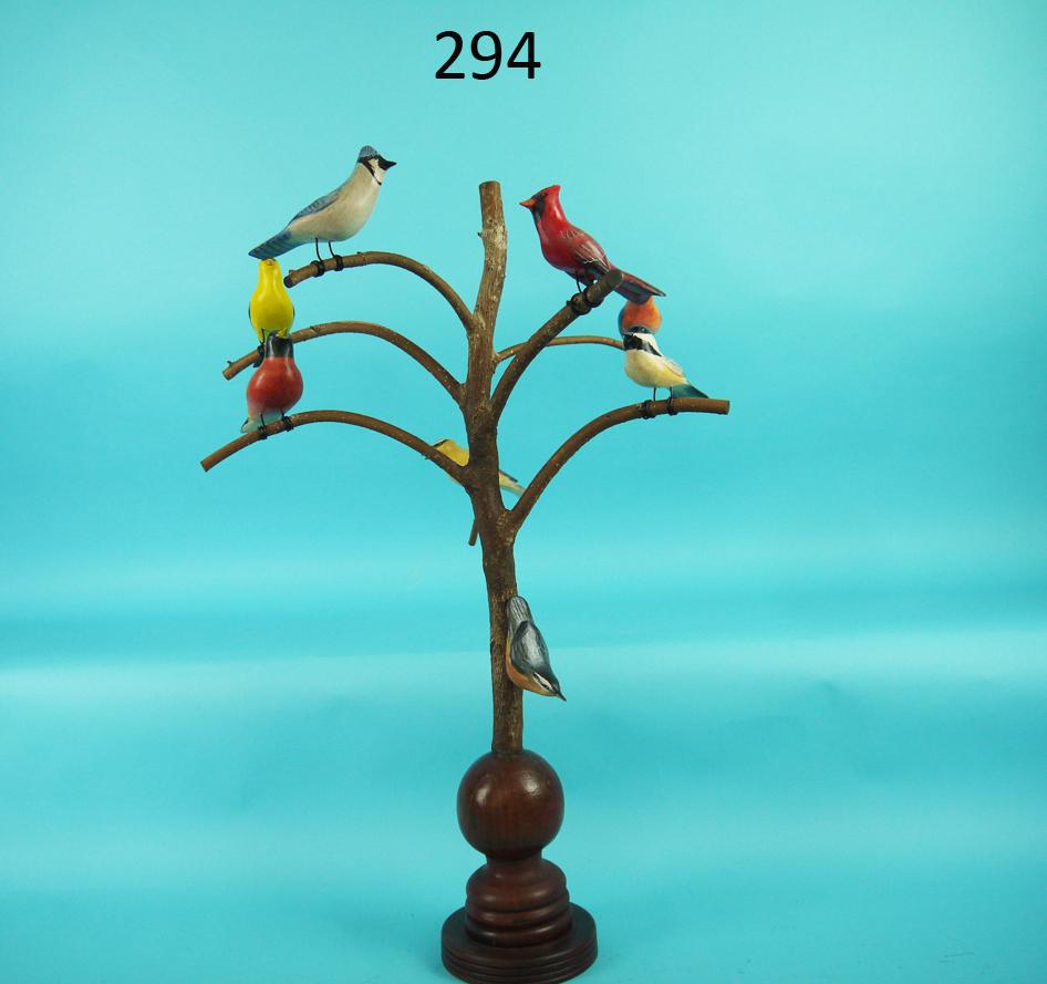 BIRD TREE WITH EIGHT SONG BIRDS, K. KIRBY: FOLK ART BIRD TREE WITH EIGHT SONG BIRDS by Ken Kirby, Little Egg Harbor, NJ. All in excellent original paint and condition. All with detailed painted feather work. All with split-tail carving. All mo