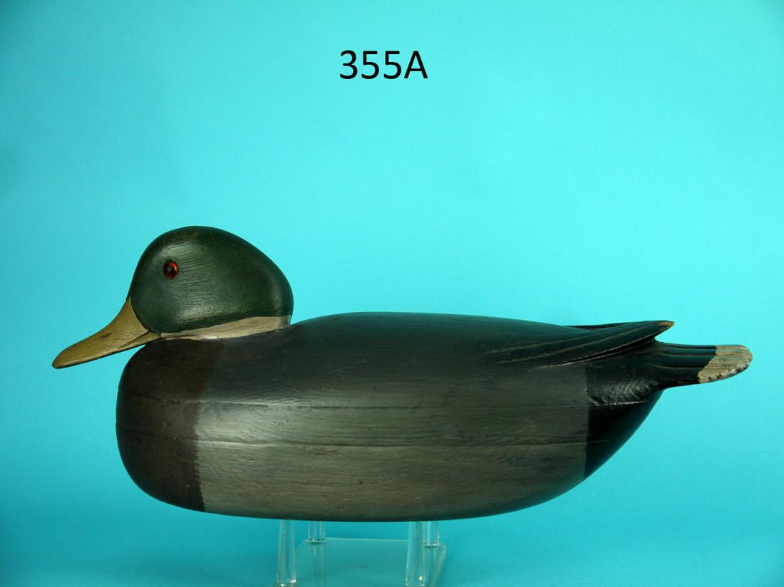 MALLARD DRAKE, DELAWARE RIVER: MALLARD DRAKE, Delaware River. Appears to be original paint. Very good structural condition. Tiny chip to wing tip. Snug-head model, hollow construction. Raised carved wing tips and fluted tail carvin