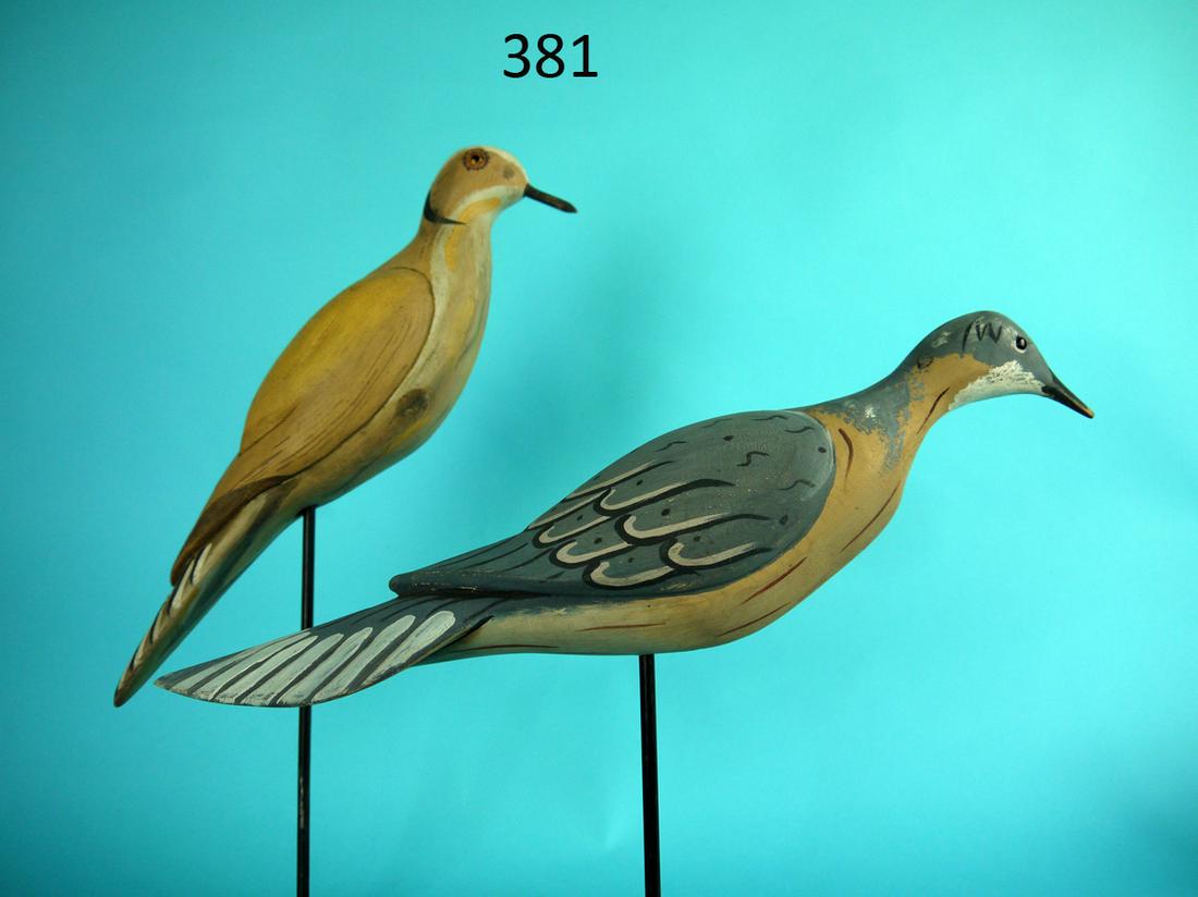 TWO DOVE DECOYS, NEW JERSEY: TWO DOVE DECOYS New Jersey. Very good original paint and structural condition. Both with relief-carved heart-shaped wings. One with two placement holes. Both with black bead eyes. Fine folk art exampl
