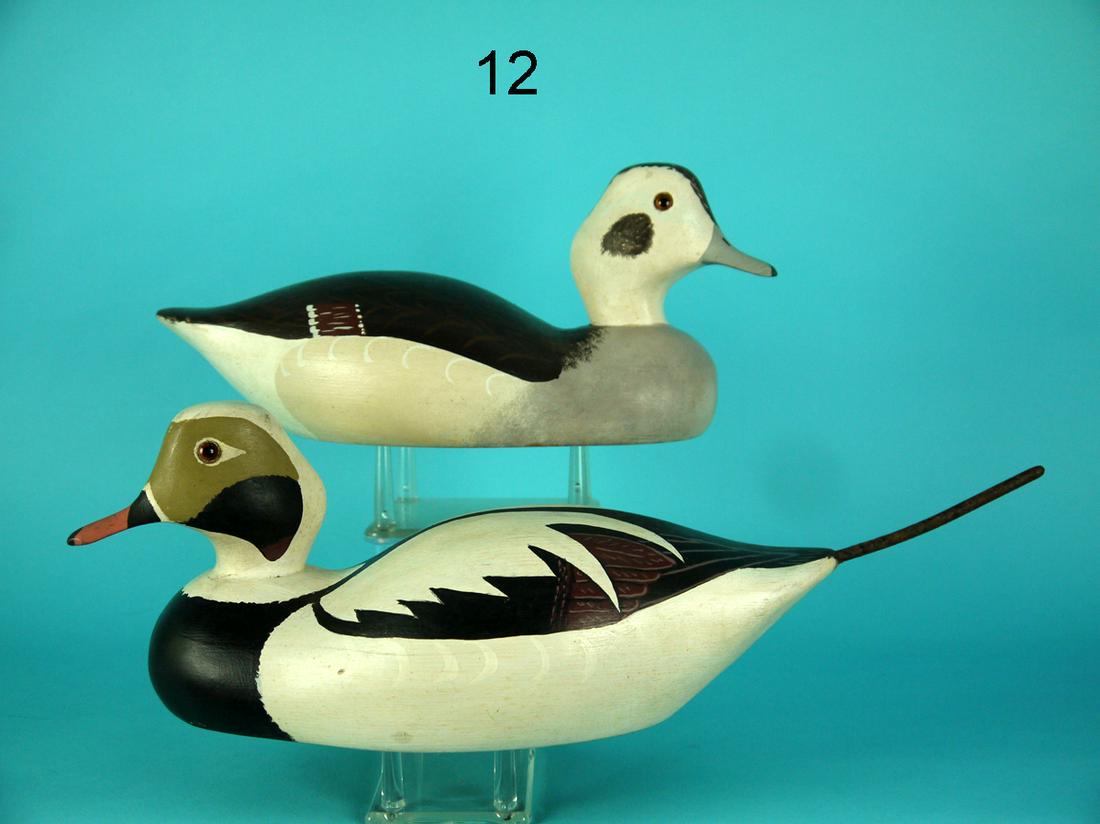 OLD SQUAW PAIR, WILDFOWLER: FINE PAIR OF OLD SQUAWS by the Wildfowler Decoy Co., Pt. Pleasant, NJ. Excellent original paint and structural condition. Hollow construction. Painted feather work to wing tips and heads. Hen with det