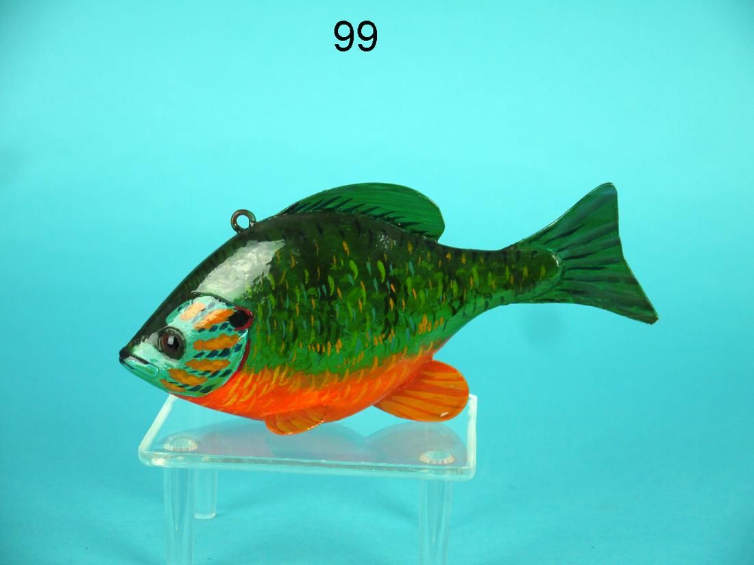 SUNFISH JIGGING LURE, A. HILLMAN: COLORFUL SUNFISH JIGGING LURE by Anthony Hillman, Cape May, NJ. Excellent original paint and structural condition. Painted scale detail. Metal fins and tail. Retains glass eyes and small screw eye for
