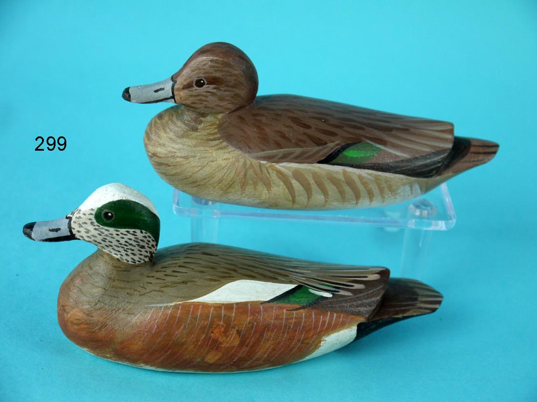ONE-QUARTER SIZE WIGEON PAIR, D. RHODES: ONE-QUARTER SIZE PAIR OF WIGEON by Dave Rhodes, Absecon, NJ. Very good original paint and structural condition. Nice painted feather detail overall. Raised wing tip carving. Both signed by the maker a