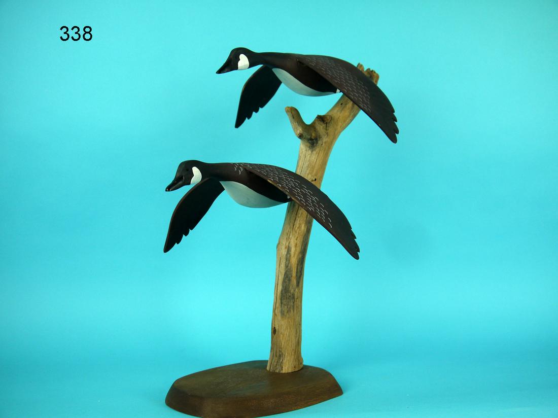TWO ONE-QUARTER FLYING CANADA GEESE, T. HANSON (1 of 2)