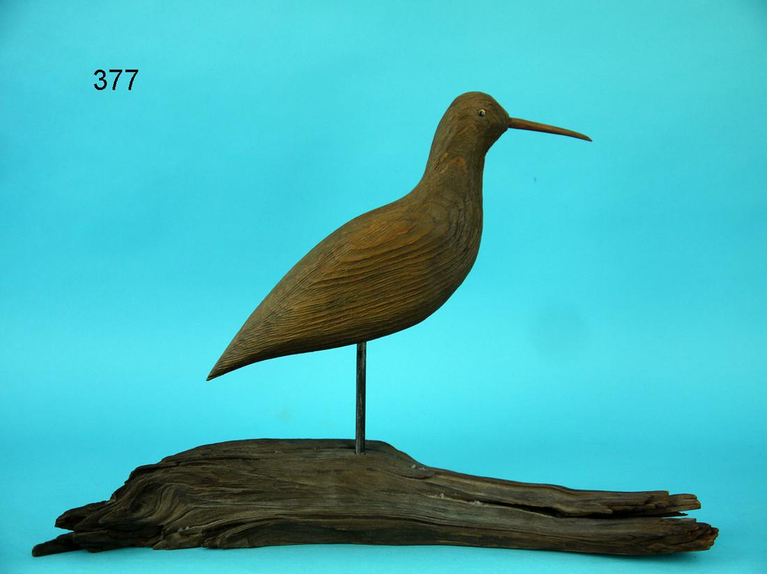 SHOREBIRD, C.S. CRAMER: SHOREBIRD by C. Stanley Cramer, Bass River, NJ. Void of paint and in good structural condition. Retains bead eyes and original bill. Mounted atop a custom base. Overall length is approximately 12 1/4 