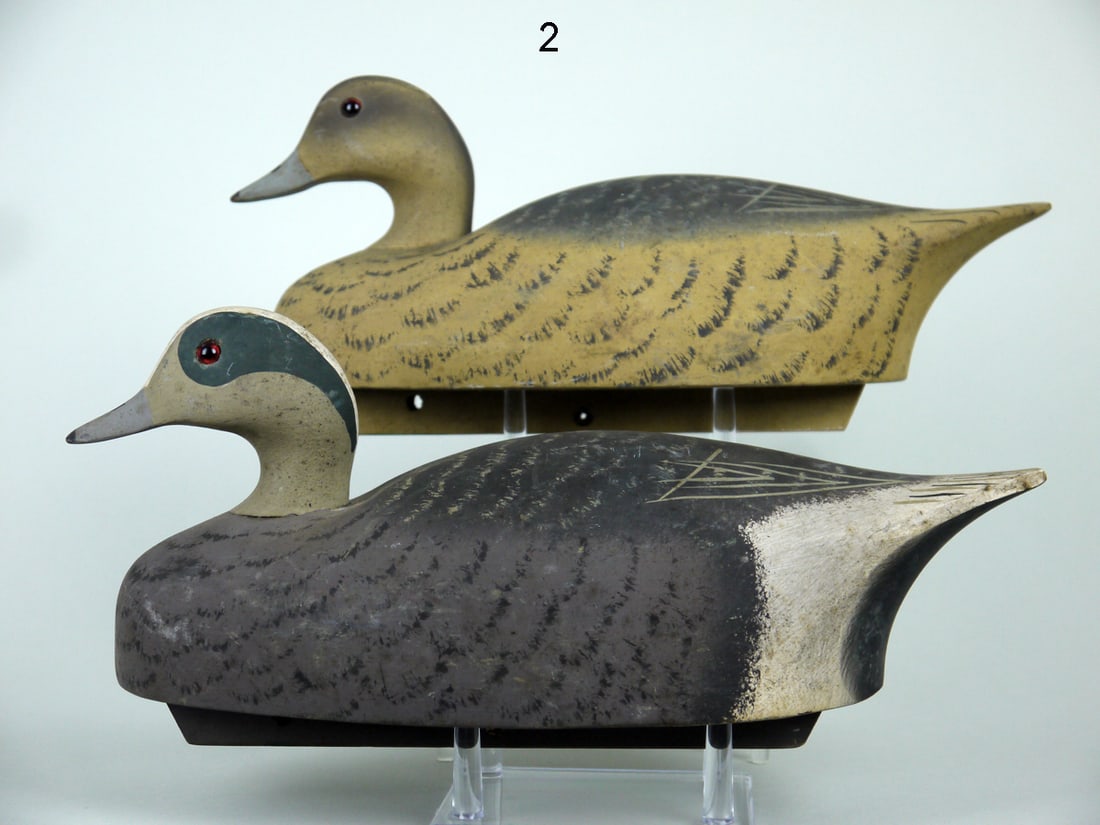 WIGEON PAIR, WILDFOWLER: FINE PAIR OF WIGEON by the Wildfowler Decoy Co., Pt. Pleasant, NJ. Very good original paint and structural condition. Small rub to top of hen's head. Nice painted feather detail to both. Head with gla