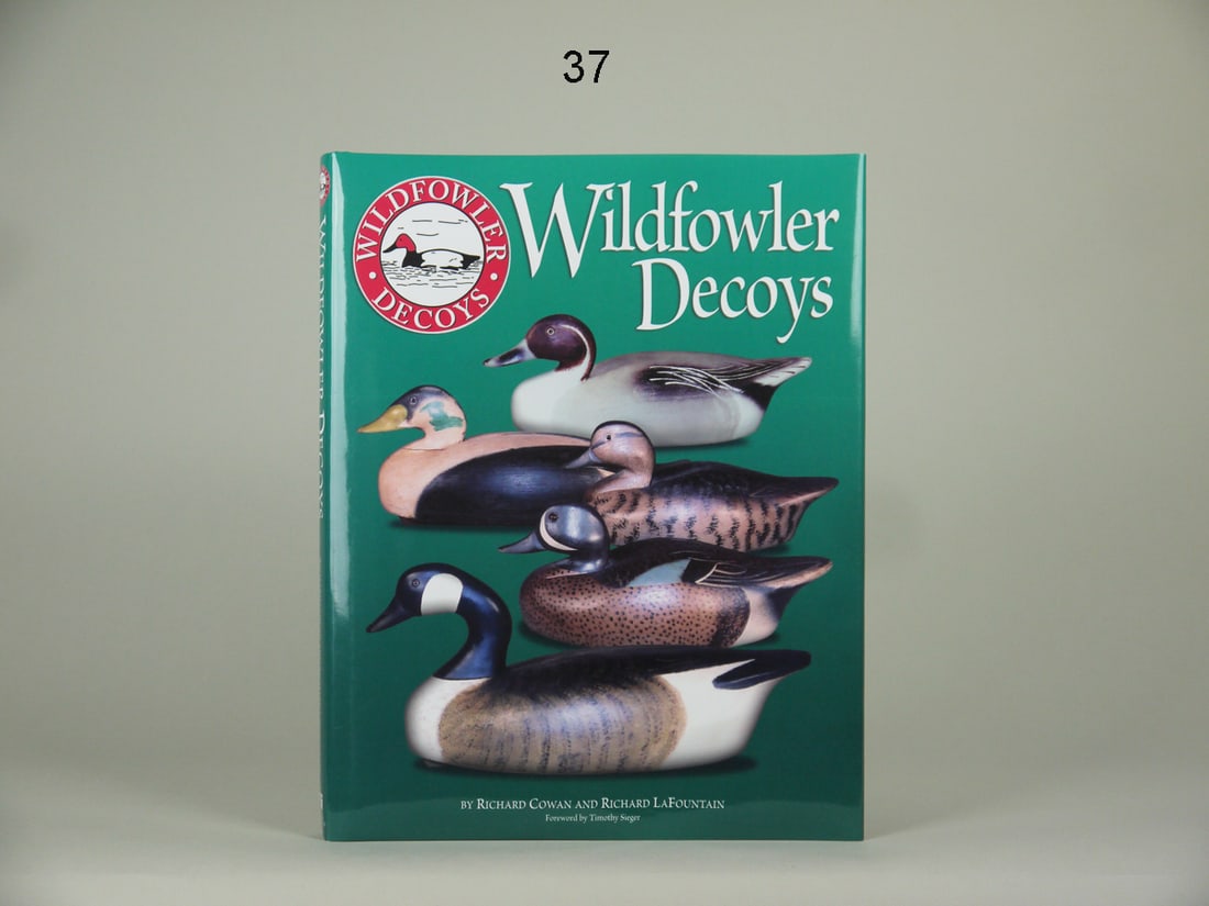 "WILDFOWLER DECOYS," COWAN AND LAFOUNTAIN: " WILDFOWLER DECOYS" by Richard Cowan and Richard LaFountain. Excellent condition, uncracked spine. Hard cover. Signed by both authors. An excellent resource for Wildfowler collectors. 50-75