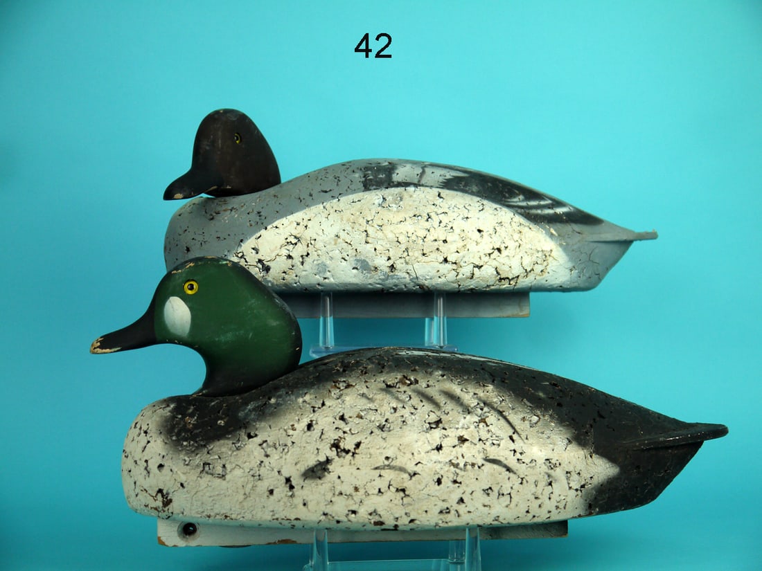 GOLDENEYE PAIR, L.L. BEAN: PAIR OF GOLDENEYES by L.L. Bean, Freeport, ME. God original paint and structural condition. Some paint flaking and scuffs to heads. Cork construction. Both with wood tail inserts. Hen's head turned. B