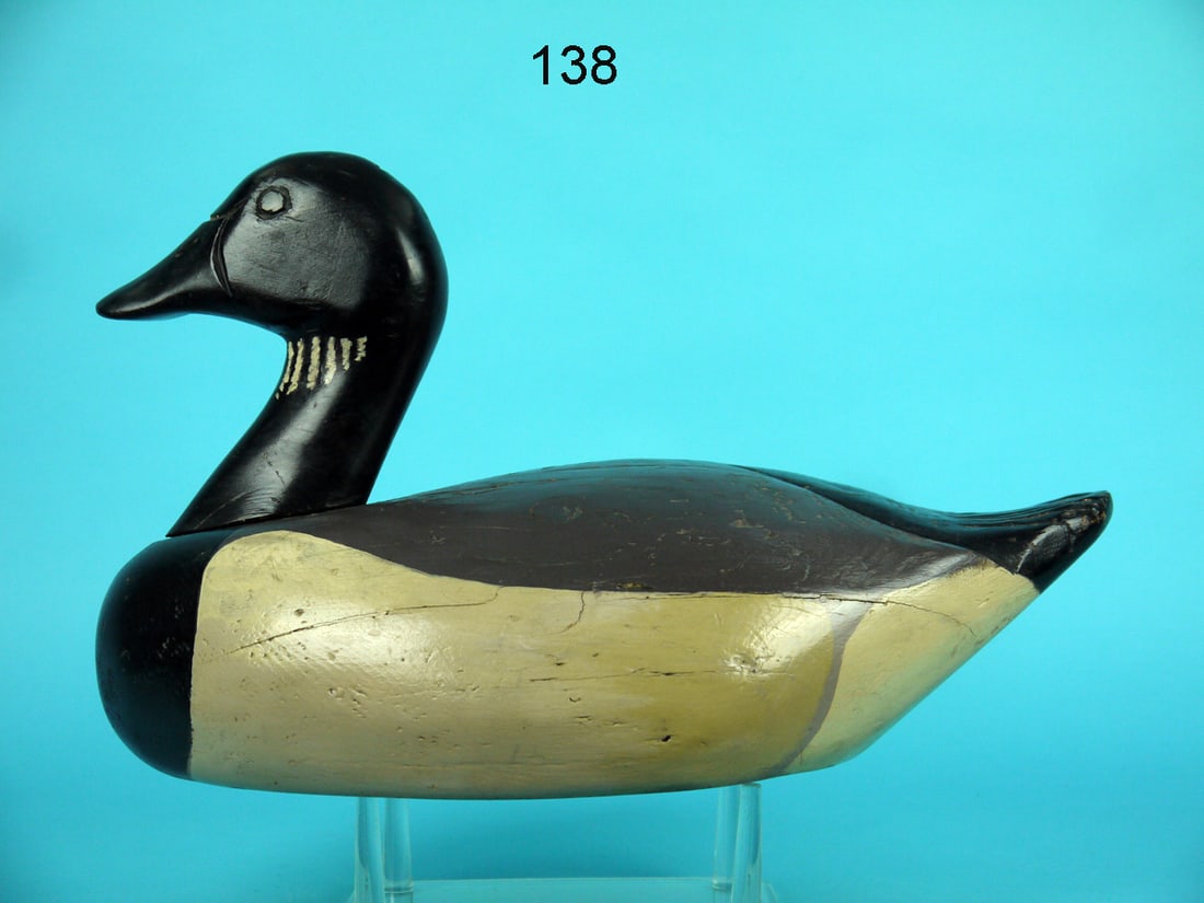 BRANT, CANADA: BRANT, probably Canada, in very good original paint and structural condition. Hit by shot on one side. Carved wing tips and deep fluted tail carving. Carved eye and nostril detail. Head very slightly 