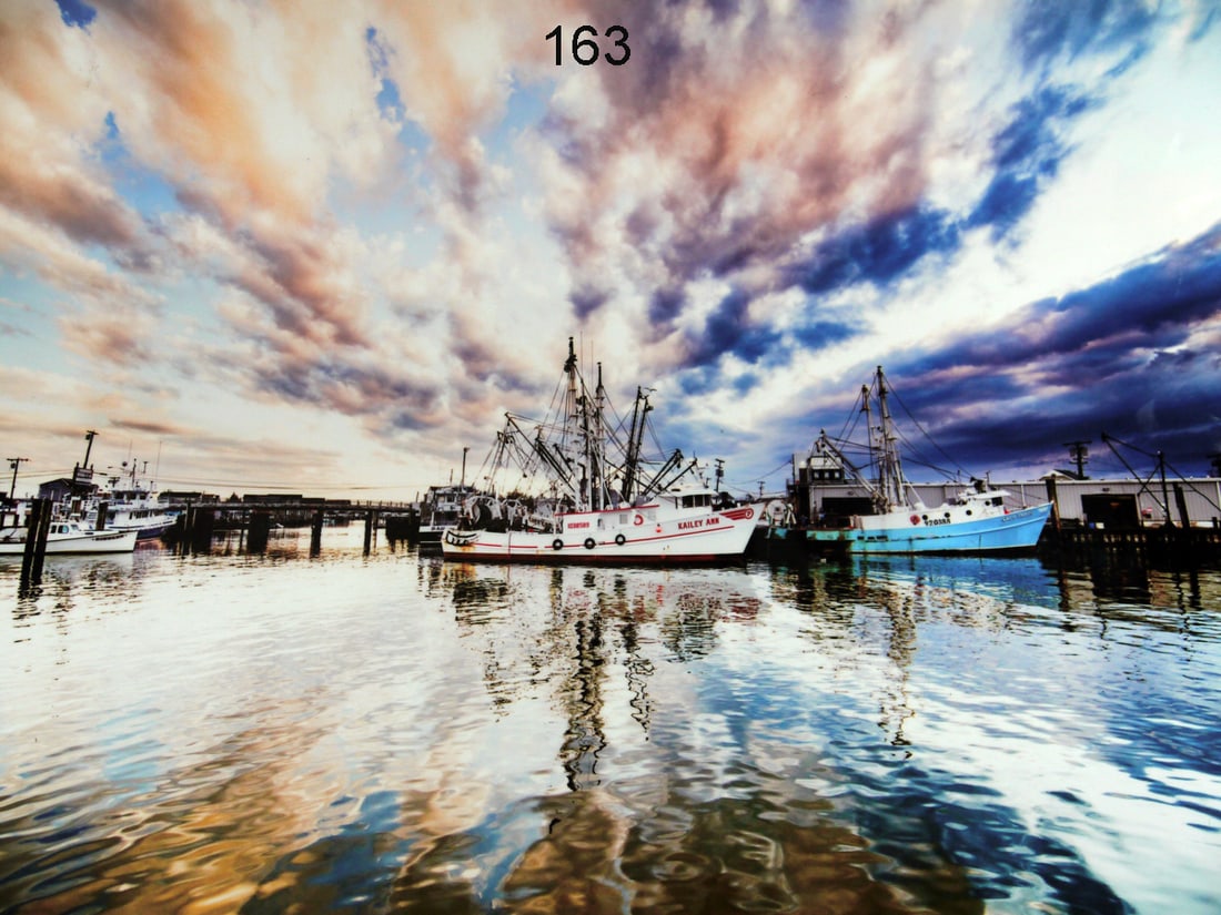 "SUNSET", T. LYNCH: "SUNSET" by Tom Lynch. Aluminum 3-D photograph of a sunset at Point Pleasant Beach, NJ. Excellent condition. H: 16 inches, W: 20 inches. 75-100