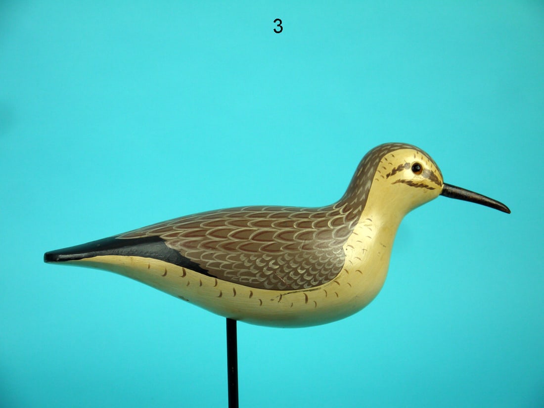 PLOVER, WILDFOWLER: PLOVER by the Wildfowler Decoy Co., Pt. Pleasant, NJ, circa 1960s. Very good original paint and structural condition. Nice painted feather detail to back and sides. Retains glass eyes and original bil