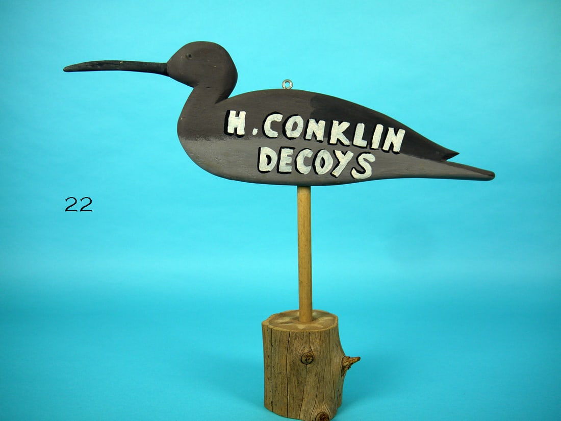 TRADE SIGN, HURLEY CONKLIN: TRADE SIGN by Hurley Conklin, Manahawkin, NJ. Very good original paint and condition. Carved eyes and screw eye for hanging. Branded H. CONKLIN. Mounted atop a custom base. Overall length is approxima