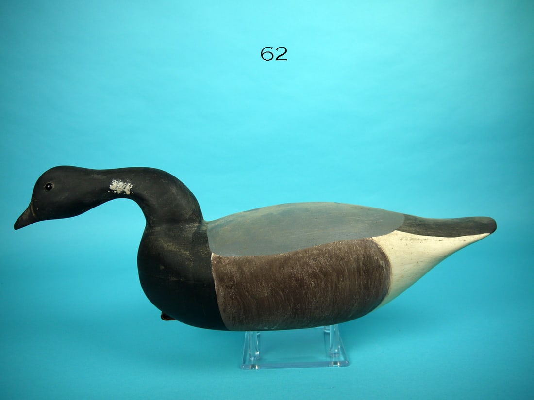 BRANT, M. FORD: EARLY SWIMMING BRANT by Mark Ford, New Gretna, NJ. Original paint with some discoloration and rubs. Very good structural condition. Hollow construction. Signed by maker and dated 1982, along with nota