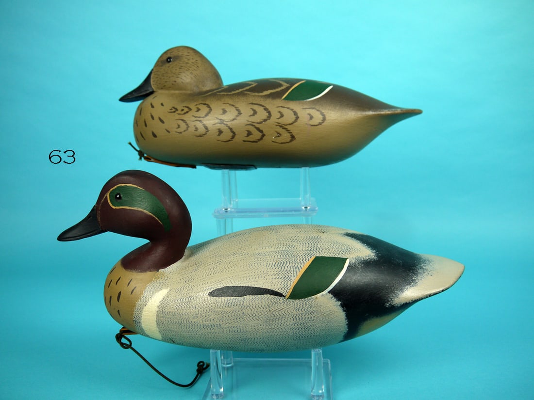 GREEN WING TEAL PAIR, D. HALL: VERY FINE PAIR OF GREEN WING TEAL by Dolph Hall, West Creek, NJ. Very good original paint and structural condition. Hollow construction. Drake with comb-feather paint to back and sides. Hen is a snug 