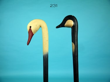 TWO CARVED WALKING STICKS