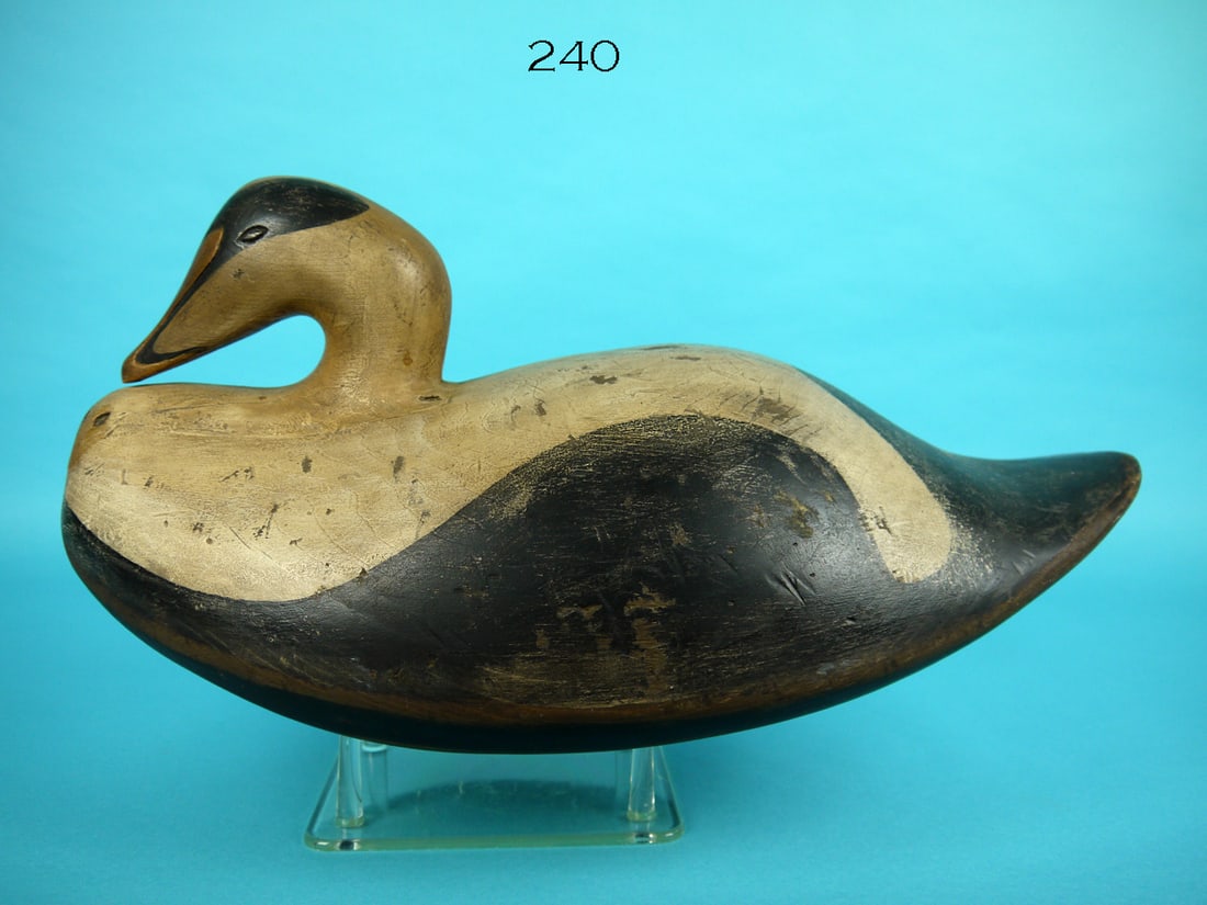 EIDER, S. MOREY: EIDER by Steve Morey, Tuckerton, NJ. Very good original antiqued paint and structural condition. Oversized model in inlet head and carved bill detail. Maker's "M" on underside. Overall length is appro