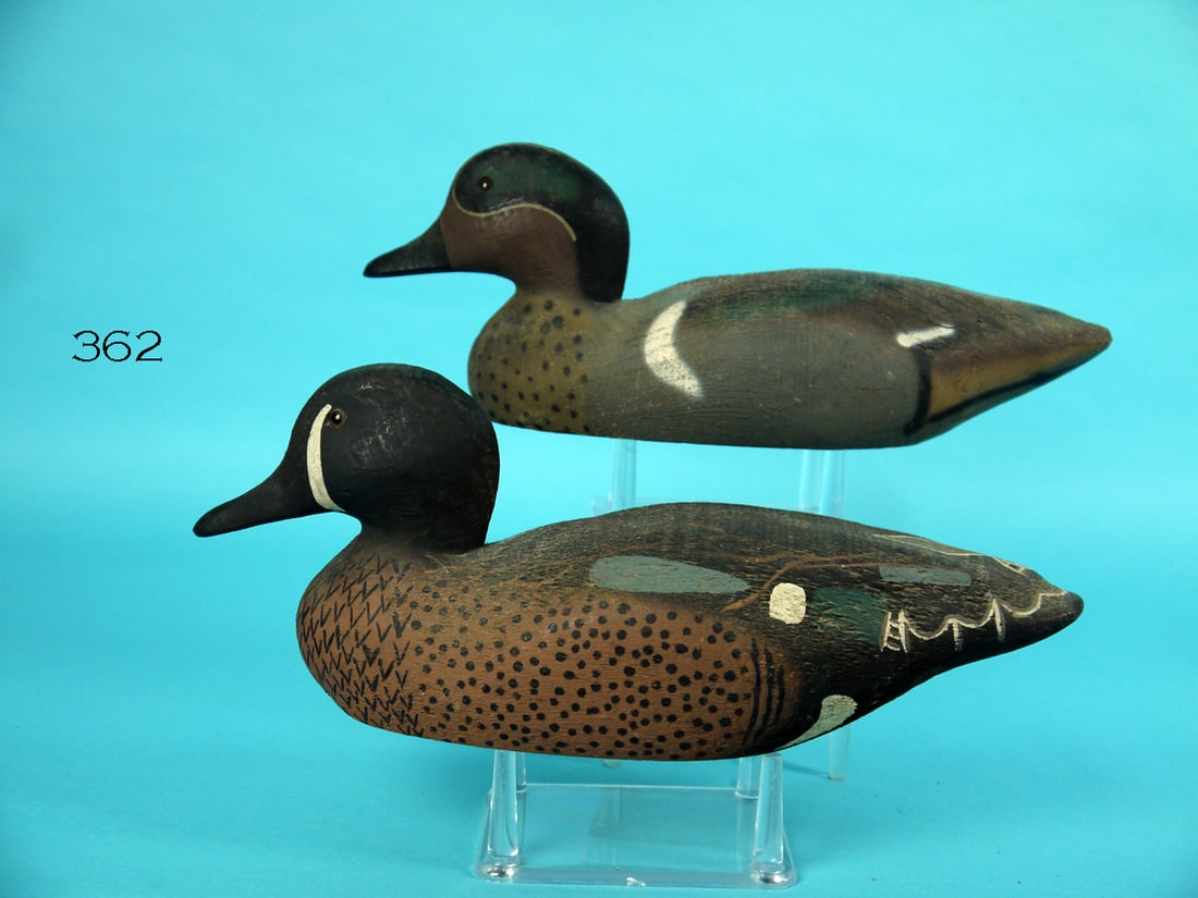 BLUE WING TEAL DRAKE/GREEN WING TEAL DRAKE, HERTER'S: BLUE WING TEAL DRAKE AND GREEN WING TEAL DRAKE by the Herter's Decoy Co., Waseca, MN. Very good original paint and unused, unrigged condition. Both retain glass eyes. Both with crisp Herter's brands.