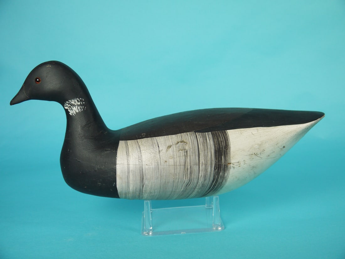 BRANT, WILDFOWLER: BRANT by the Wildfowler Decoy Company, Pt. Pleasant, NJ. Shourds model in good original paint with some roughness and rubs to body. Hollow construction. Retains glass eyes. Overall length is