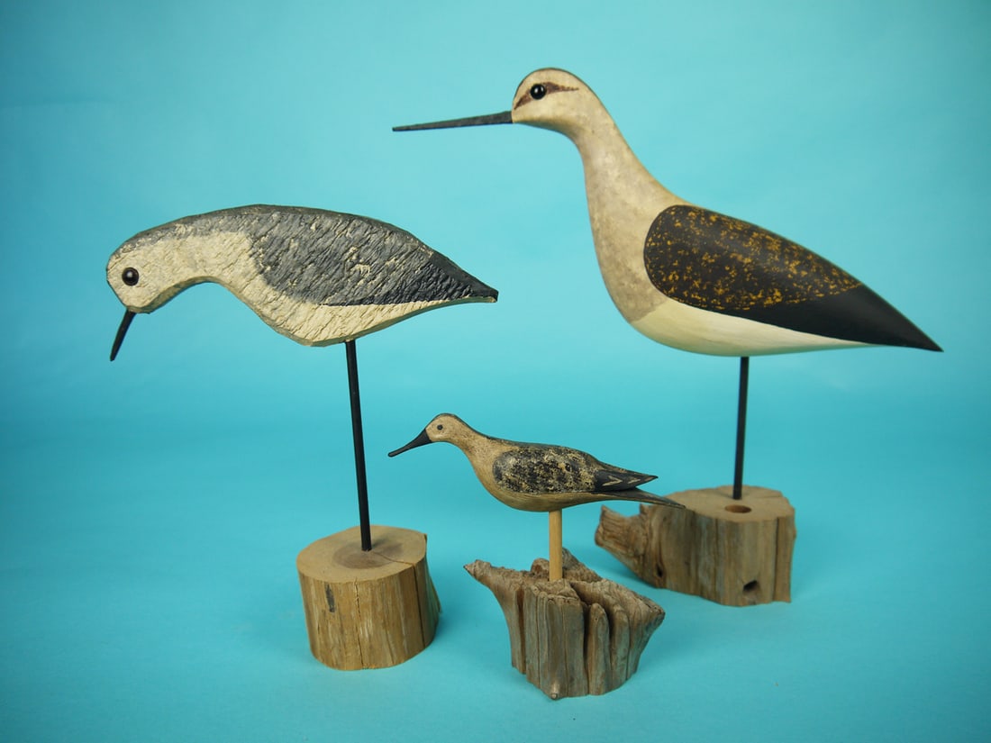 THREE SHOREBIRDS, R. DALEY/B. BIEBER: YELLOWLEGS by Rob Daley, West Creek, NJ. Very good original paint and structural condition. Full- bodied carving with painted feather detail. Together with a FEEDING SANDERLING FLATTY in very good