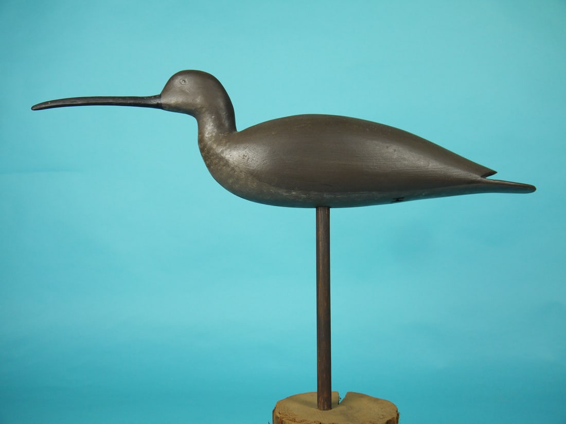 CURLEW, H. CONKLIN: CURLEW by Hurley Conklin, Manahawkin, NJ. Very good original paint and structural condition. Raised wing tips and carved eye detail. Branded H.C. Overall length is approximately 18 inches. 200-300
