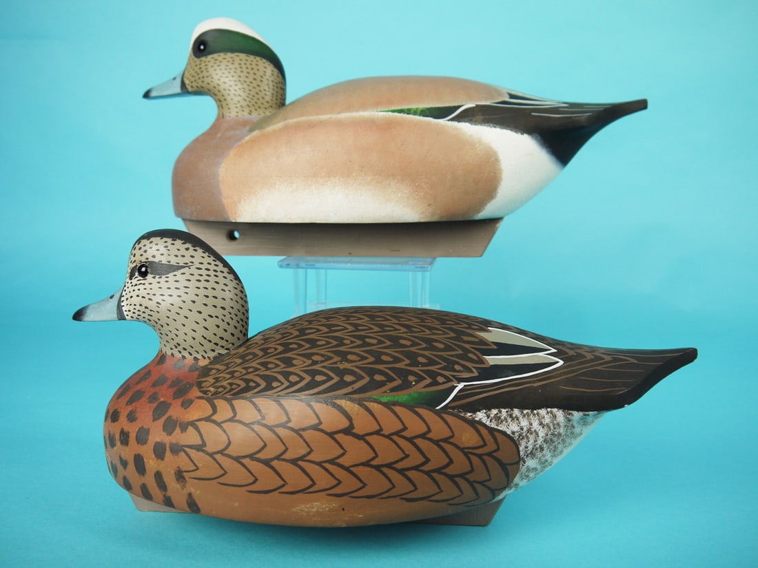 WIGEON PAIR, W. CRANMER: PAIR OF WIGEON by William Cranmer, Beach Haven, NJ. Very good original paint and structural condition. The hen with some minor rubs to breast and side. The hen with very detailed painted feather work