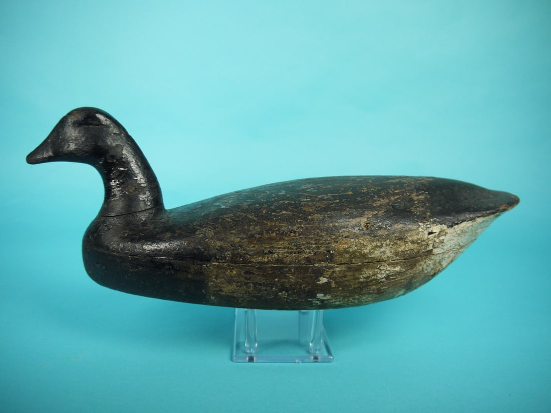 BRANT, BARNEGAT, NJ: BRANT, Barnegat, NJ. Working paint with flaking and crazing. Good structural condition with visible seam and gunning wear. Hollow construction. Retains pad weight. Overall length is approximately 17 1