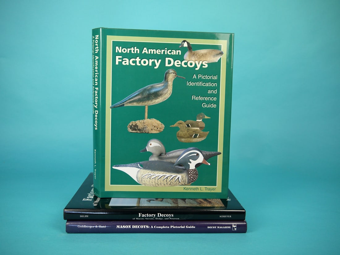 THREE DECOY BOOKS: THREE DECOY BOOKS consisting of "North American Factory Decoys" by K. Trayer, "Factory Decoys " by J. and S. Delph and "Mason Decoys" by R. Goldberger and A. Haid. All in excellent condition. 50-75
