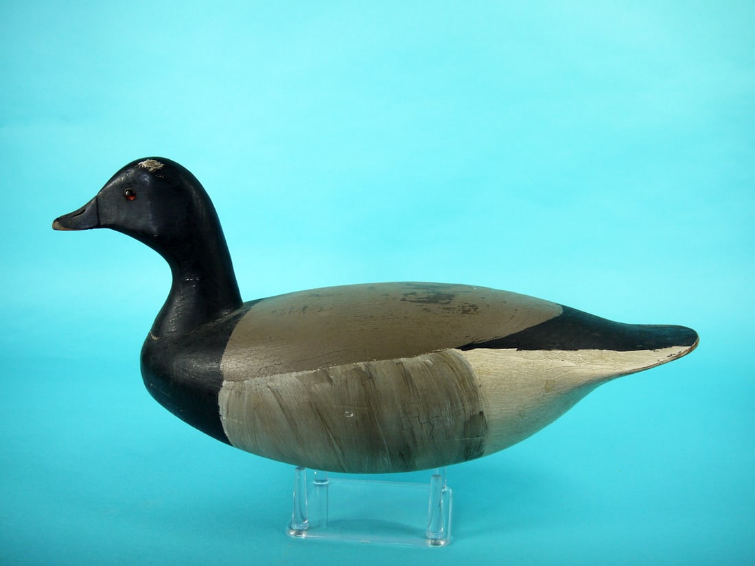 BRANT, J. HAMILTON: BRANT by John Hamilton, West Creek, NJ. Original paint with some rubs and crazing. Good structural condition. Hollow construction. Slightly turned head retains glass eyes. Retains oval inset weight. O