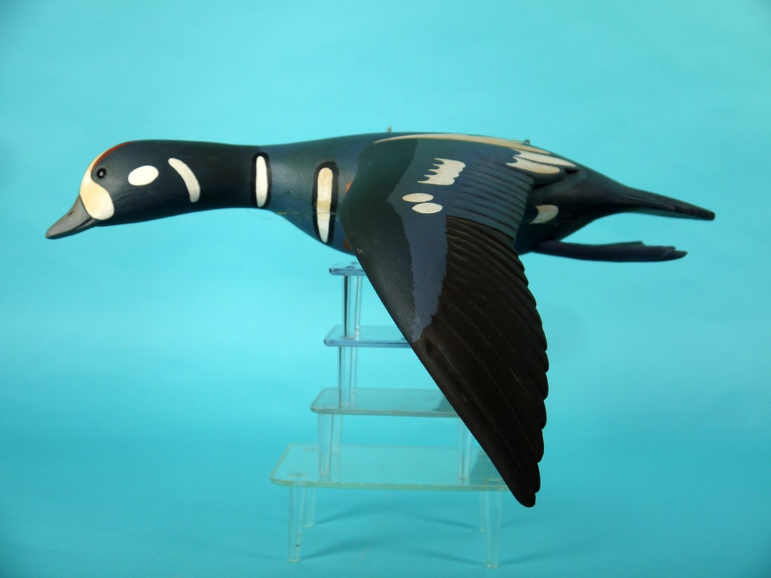 FLYING HARLEQUIN DRAKE, S. MOREY: RARE FLYING HARLEQUIN DRAKE by Steve Morey, Tuckerton, NJ. Very good original paint and structural condition. Strip of glue slightly visible on seam. Exhibits bold paint pattern. Outstretched cupped