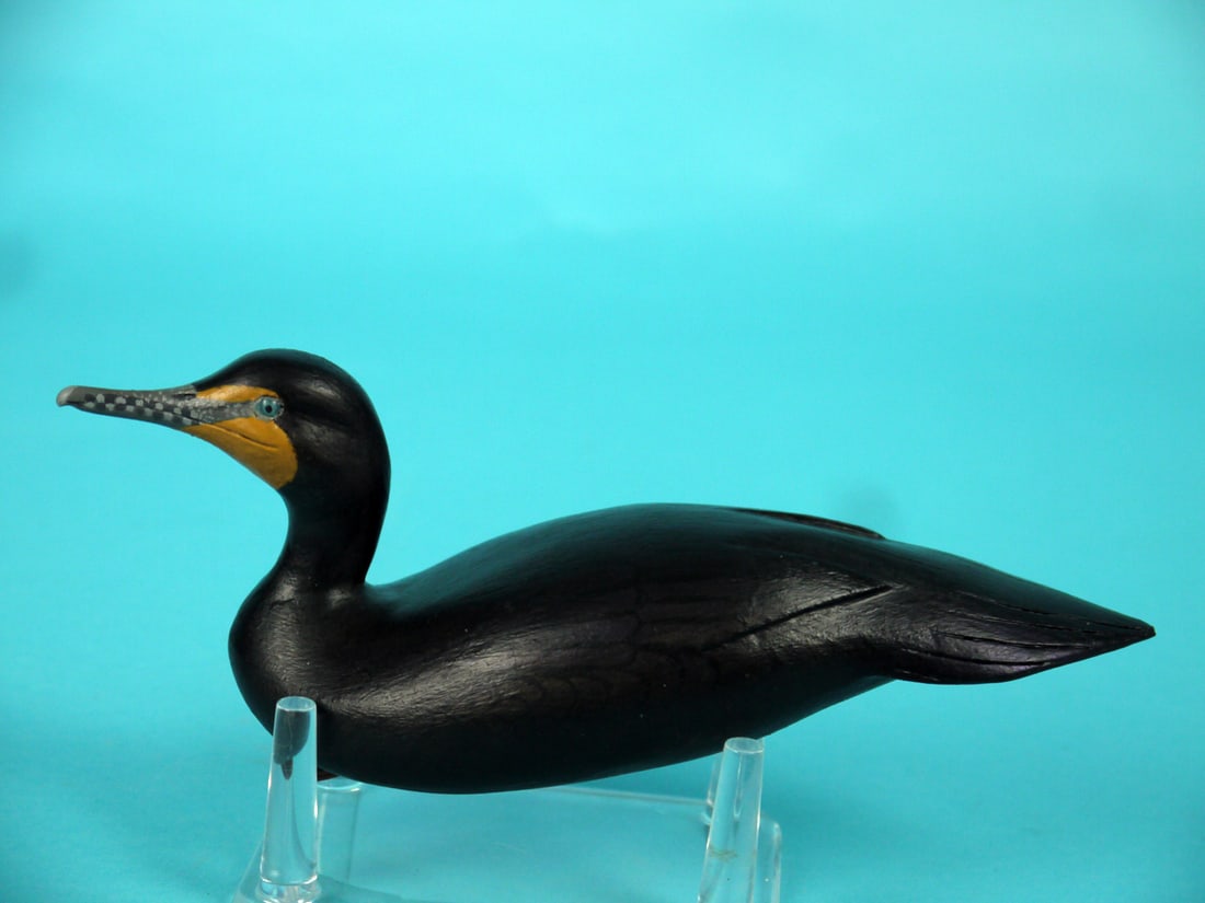 MINIATURE CORMORANT, J. WOOD: MINIATURE CORMORANT by John Wood, Venice, FL. Excellent original paint and structural condition. Detailed painted feather work to body. Relief carved wing tips and carved tail feathers. Raised head