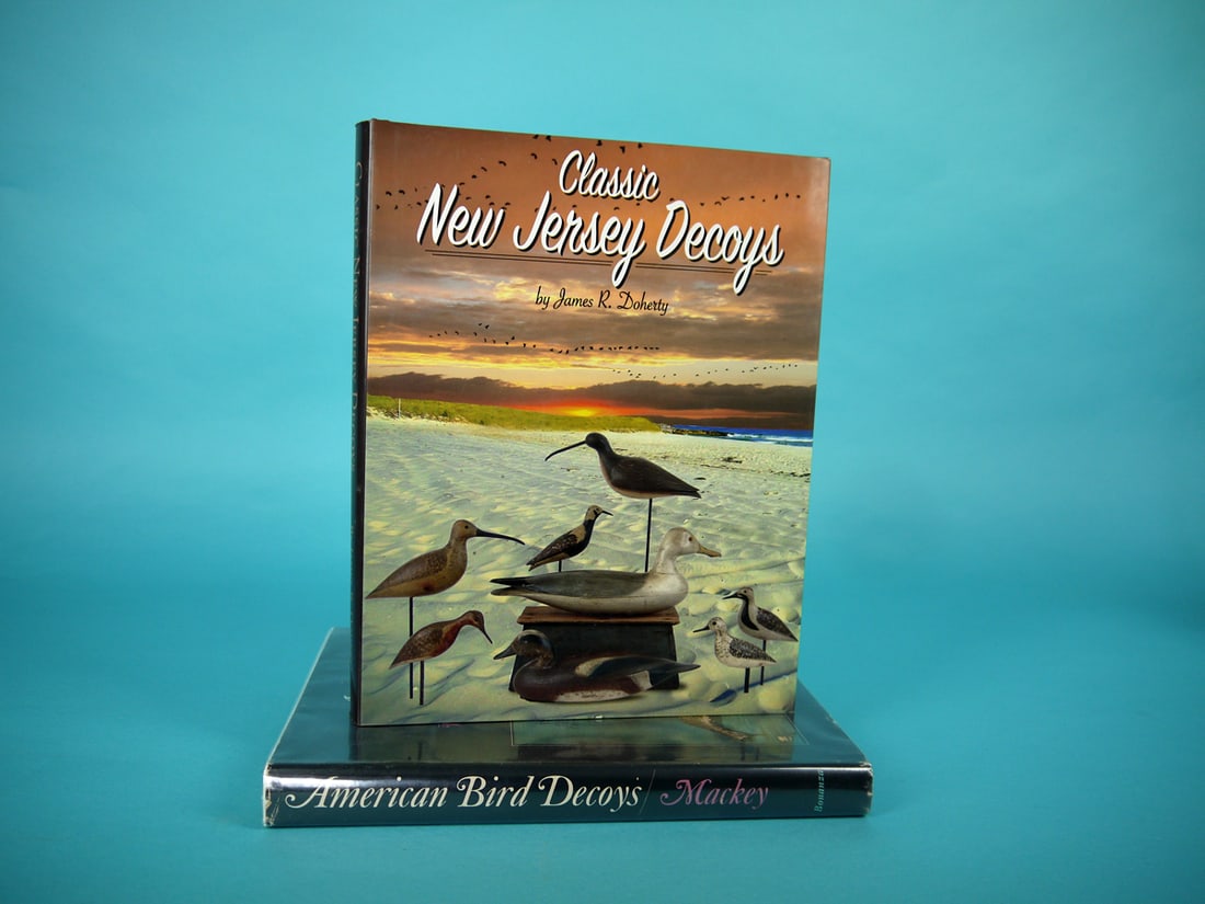 TWO DECOY BOOKS: TWO DECOY BOOKS consisting of "American Bird Decoys" by W. Mackey and "Classic New Jersey Decoys" by J.R. Doherty. Both in excellent condition. 50-75