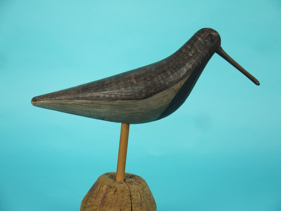 BLACK-BELLIED PLOVER, G. STRUNK: BLACK-BELLIED PLOVER by George Strunk, Glendora, NJ. Very good original paint and structural condition. Chip-carved body with painted feather detail. Retains painted eye detail and dowelled bill.