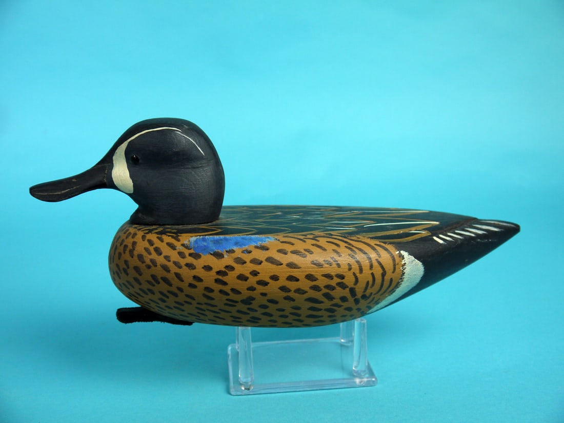 BLUE WING TEAL DRAKE, S. SUTTON: BLUE WING TEAL DRAKE by Sean Sutton, Paulsboro, NJ. Very good original paint and structural condition. Incised feather carving to back and tail. Retains black bead eyes. Bill with carved nostrils and