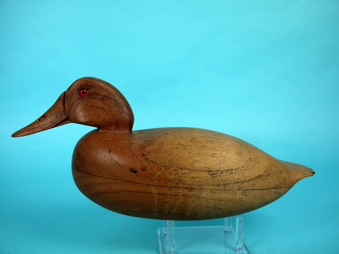 NATURAL FINISH DECOY, C.R. MARTER, JR.: NATURAL FINISH DECOY by Caleb R. Marter, Jr. Excellent structural condition. Some fading and light drips to body. Hollow construction. Smoothly sanded surface exposing intricate grain pattern. Low