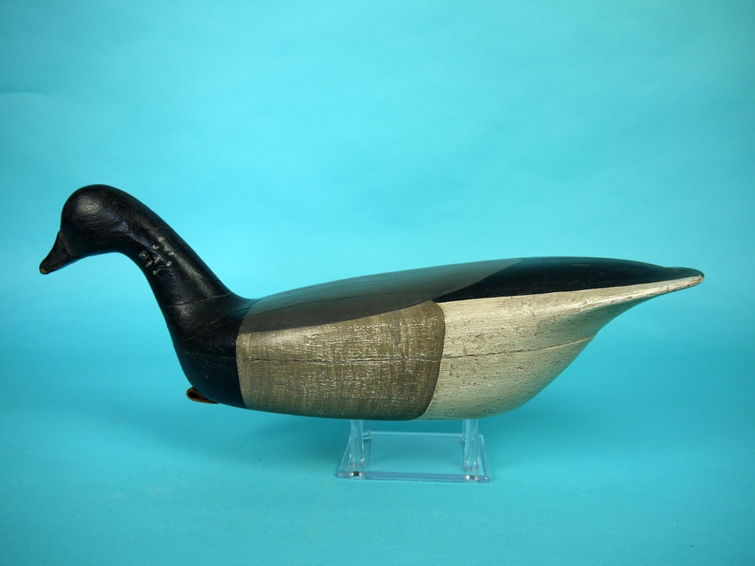 BRANT, PARKERTOWN, NJ: BRANT, Parkertown, NJ. Working paint and good structural condition. Tight neck crack and several tight checks on back. Hollow construction. Retains inlet weight. Overall length is approximately 19