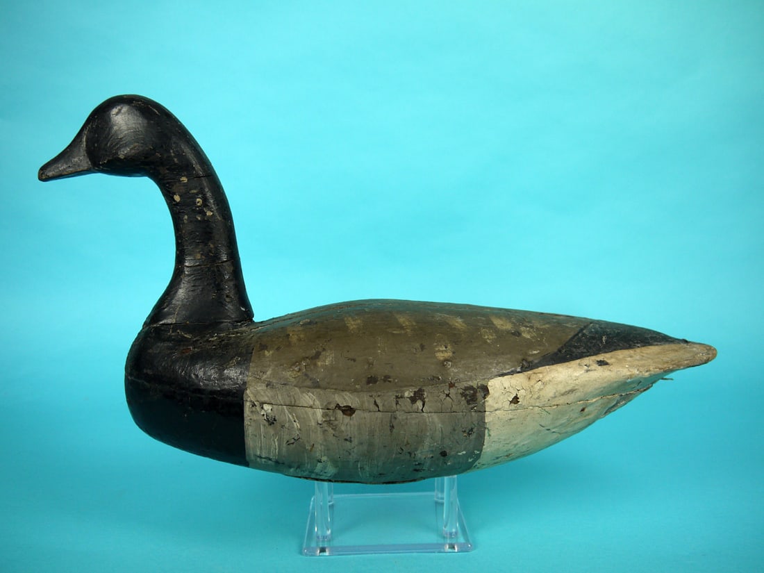 BRANT, NEW JERSEY: BRANT, New Jersey. Working paint and good structural condition with in-use wear. Several tight neck checks. Visible seam. Hollow construction. Retains pad weight. Overall length is approximately 18