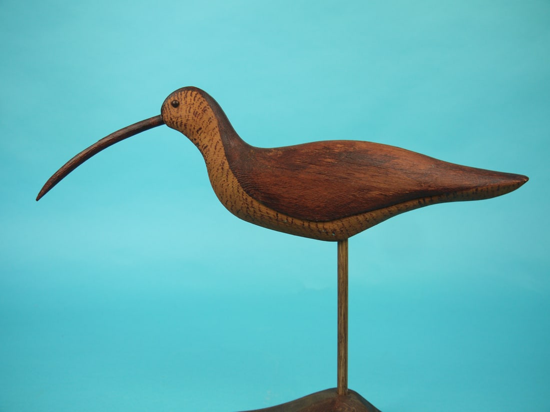 DECORATIVE CURLEW: DECORATIVE CURLEW in very good original paint and structural condition. Relief-carved wings and carved bill. Retains tack eyes. Signed by maker (illegible) and dated 2017. Overall length is