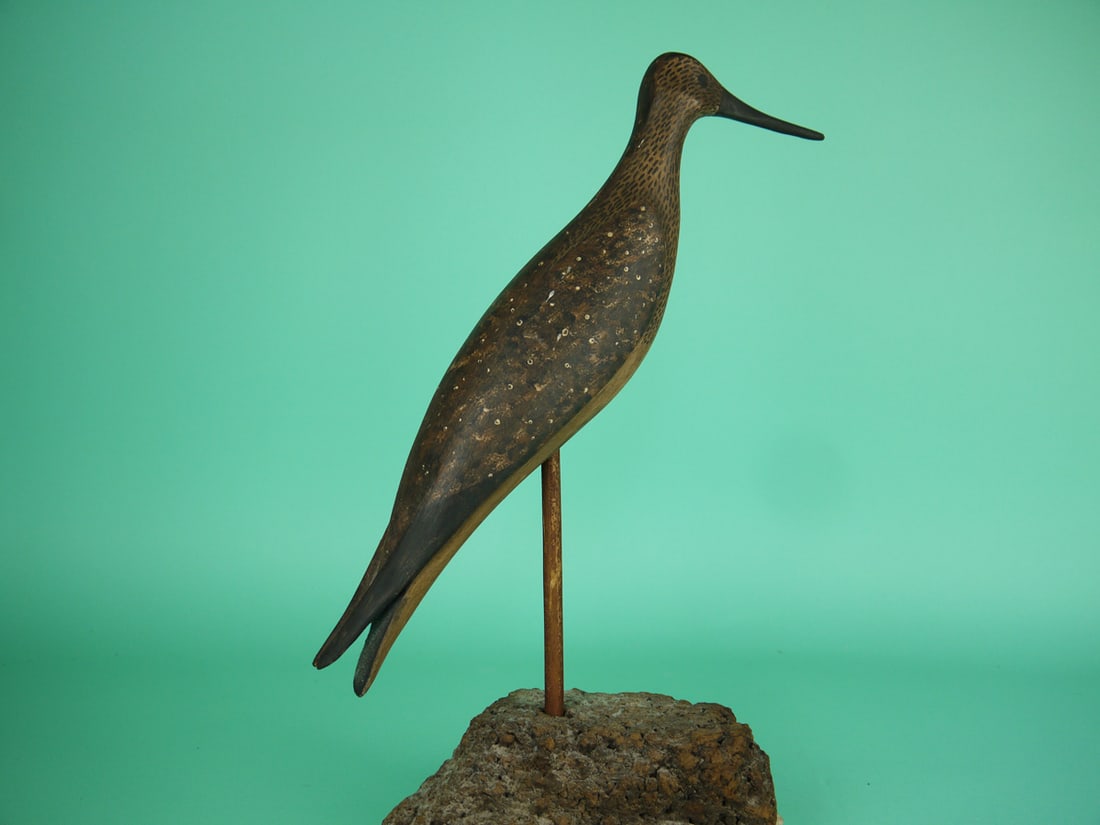 YELLOWLEGS, B. BIEBER: YELLOWLEGS by Bruce Bieber, Cape May, NJ. Very good original paint and structural condition. Relief-carved wings with raised wing tips. Maker's B branded on underside. Mounted on a custom base. Overal