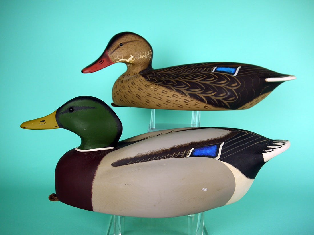 MALLARD PAIR, A. BIRDSALL: PAIR OF MALLARDS by Art Birdsall, Pt. Pleasant, NJ. Good original paint and structural condition. Hen with some sap bleed to neck and side of head. Hollow construction. Full-bodied carvings with