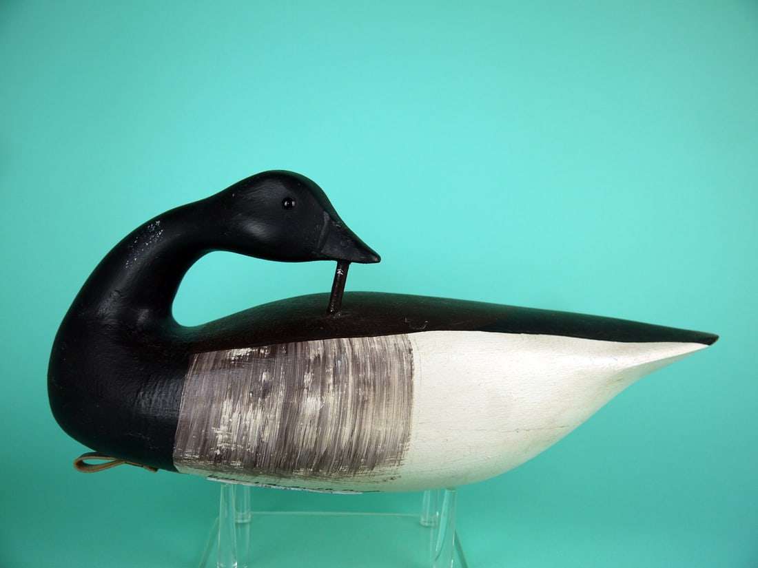 BRANT, A. BIRDSALL: BRANT by Art Birdsall, Pt. Pleasant, NJ. Very good original paint and structural condition. Hollow construction. Preening model with head secured with a metal rod. Retains glass eyes. Retains pad