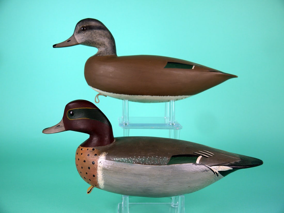 GREEN WING TEAL PAIR, H. CONKLIN: PAIR OF GREEN WING TEAL by Hurley Conklin, Manahawkin, NJ. Very good original paint and structural condition. Hollow construction. Both with incised wing tips. Both heads very slightly turned and