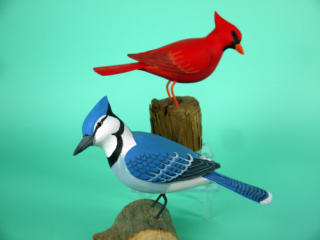 TWO SONGBIRDS, H.V. SHOURDS: TWO SONG BIRDS by Harry V. Shourds, Seaville, NJ. The BLUE JAY and CARDINAL are both in excellent original paint and structural condition. Both with relief-carved wings and raised, carved wing tips.