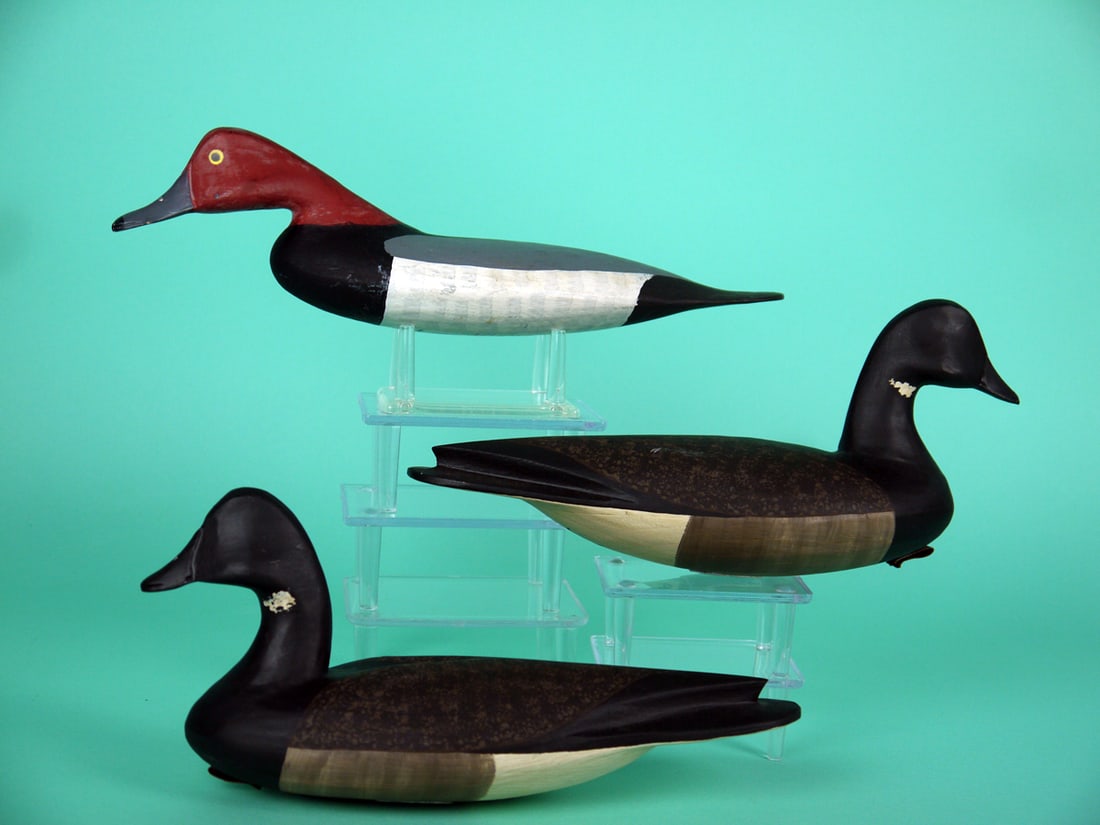 THREE MINIATURE DECOYS, R. DALEY: THREE MINIATURE DECOYS by Rob Daley, West Creek, NJ, consisting of a REDHEAD, and two BRANT. Very good original paint and structural condition. Hollow construction. Both brant with raised wing tips.
