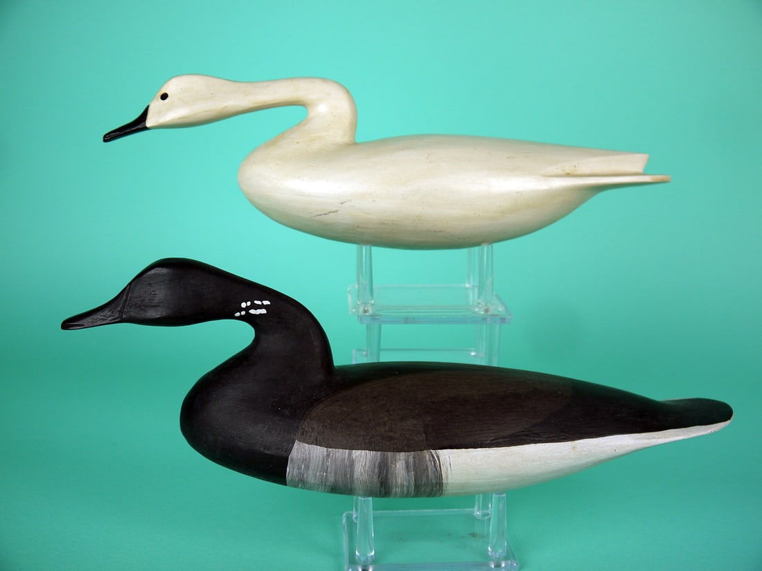 MINIATURE SWAN AND BRANT, R. DALEY: MINIATURE SWAN AND BRANT by Rob Daley, West Creek, NJ. Very good original paint and structural condition. Both swimming models. The swan with raised wing tips. Both hollow construction. Both signed