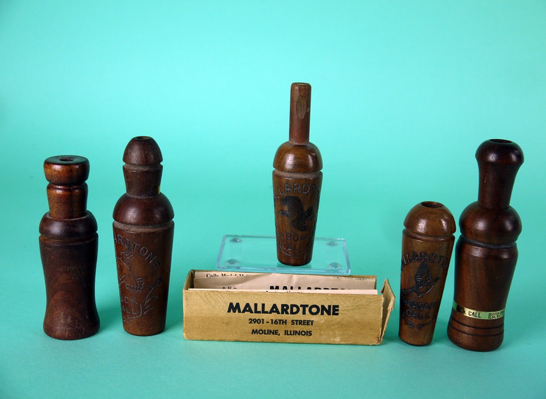 FIVE GAME CALLS: FIVE GAME CALLS consisting of three calls by MALLARDTONE, Moline, IL. The group includes a duck call, pheasant call and goose call (with partial box). Also a DUCK CALL by Scotch Game Call Co., Elba,