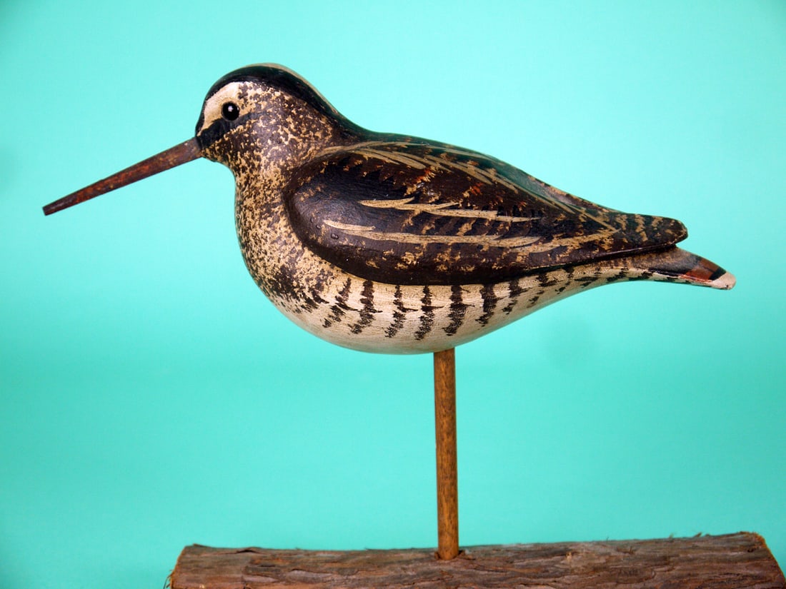 WILSON'S SNIPE, S. MOREY: WILSON'S SNIPE by Steve Morey, Tuckerton, NJ. Very good original paint and structural condition. Plump carving with relief-carved wings and crossed wing tips. Retains glass eyes and nail bill.
